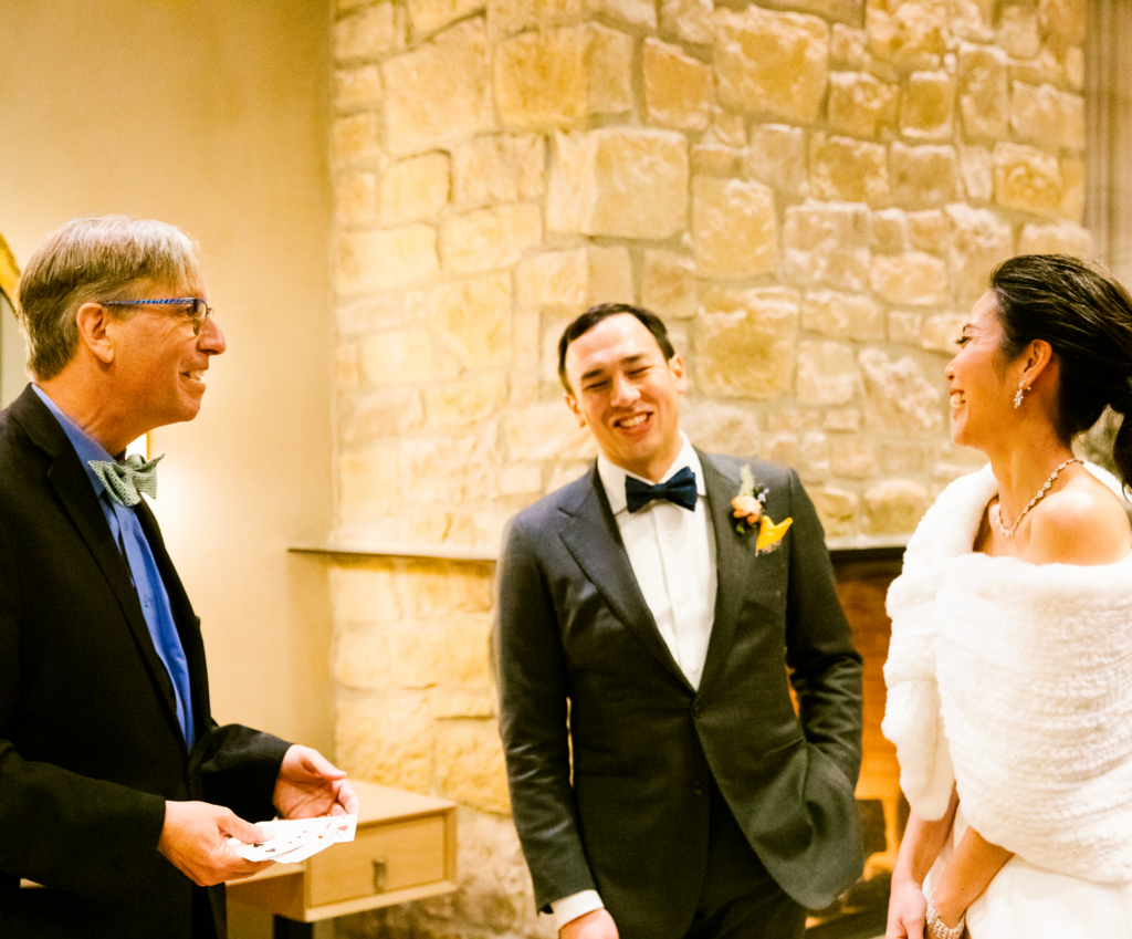 Wedding guests enjoying close-up magic