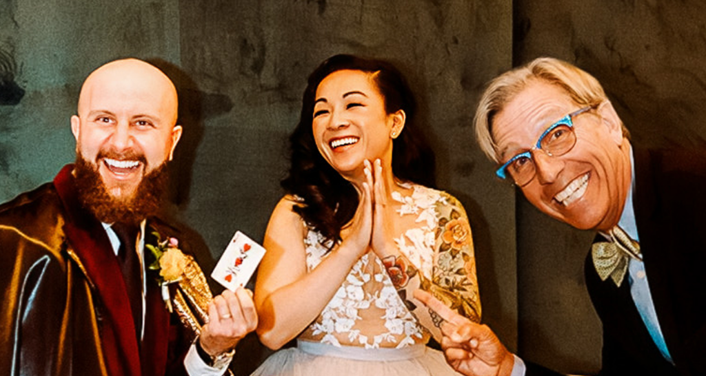 Tom Collett performing magic for a group